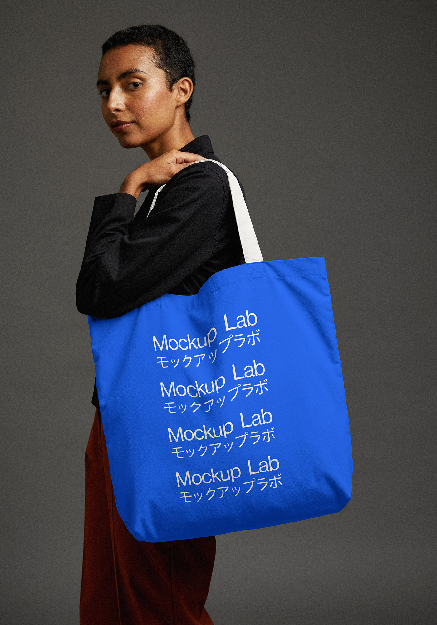 Front view of a white tote bag mockup with customizable fabric and handle colors.